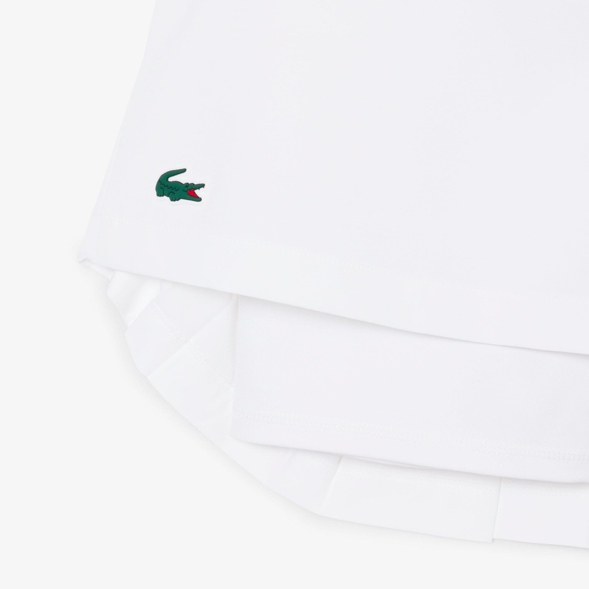 Lacoste Jupe Golf Ultra Dry shorty intégré Blanche