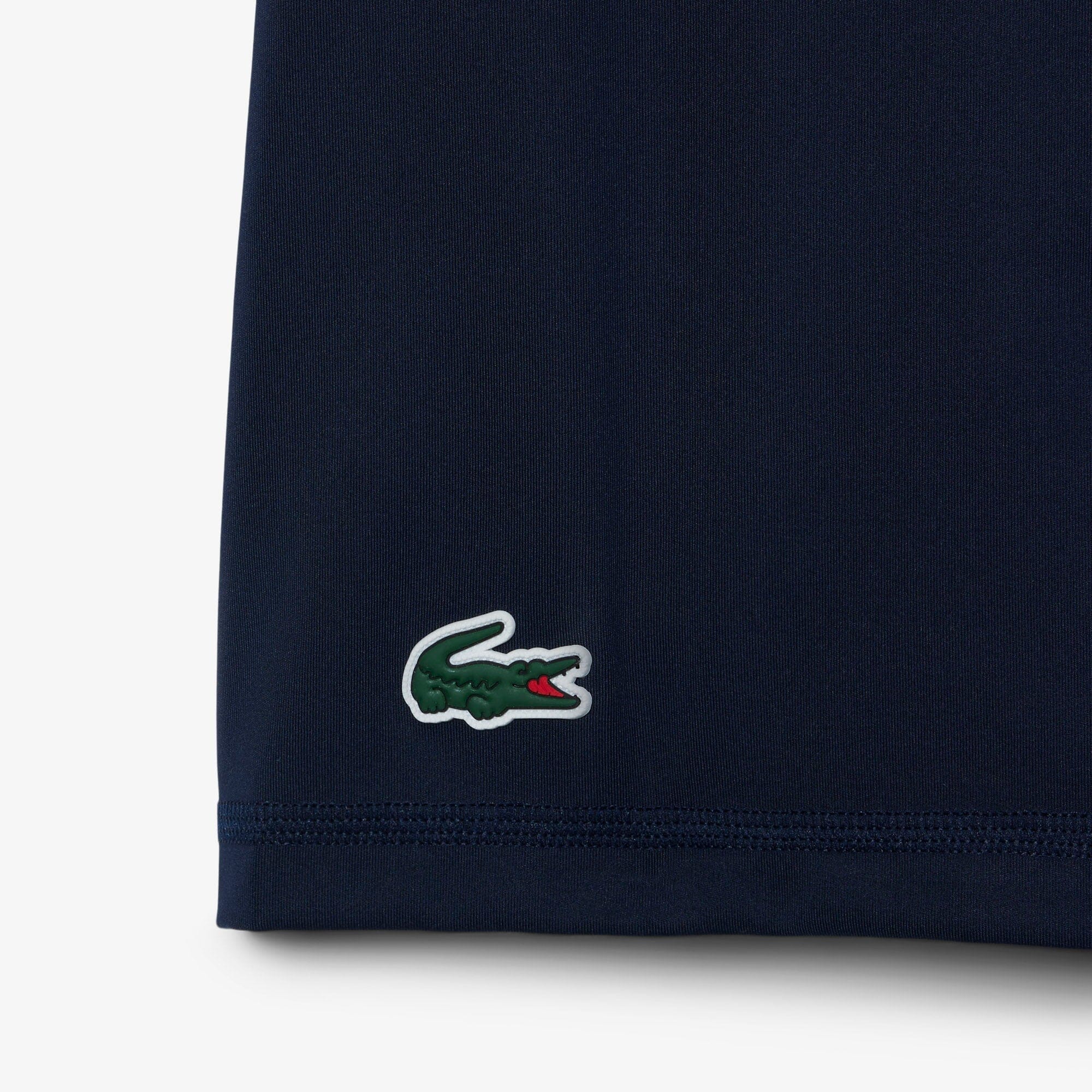 Lacoste Robe polo Golf ultra dry Bleu Marine Blanche